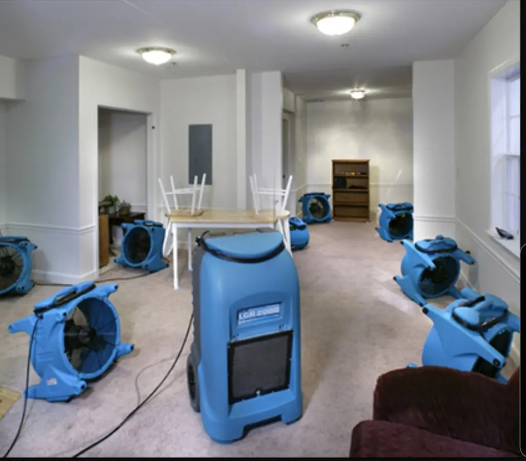 Air movers and dehumidifier setup for Water Damage Restoration in Southwick